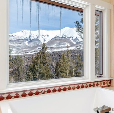 Enjoy a relaxing soak in the master bathtub