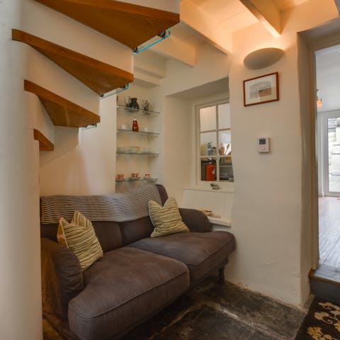 Find a cosy spot in the snug to read a good book