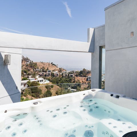 Soak in the sweeping views whilst relaxing in the hot tub