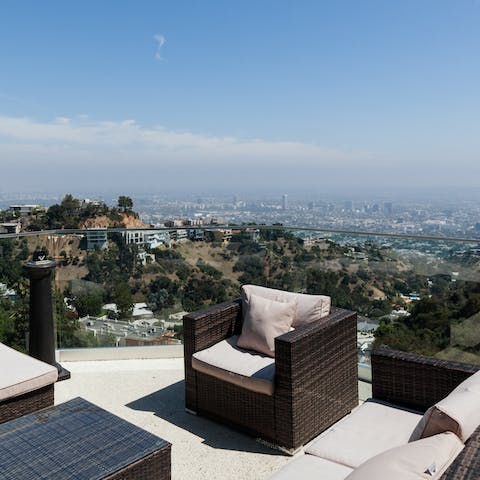 Raise a glass to the spectacular sunset on the terrace