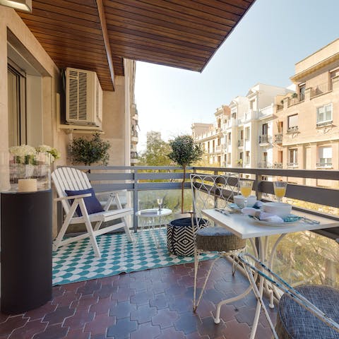 Enjoy breakfast on the private balcony or sip a sundowner in the armchair while indulging in some people-watching