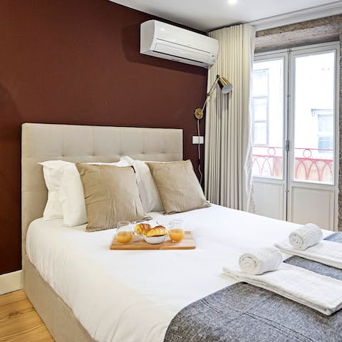 Sink into a comfortable bed after a hectic day spent seeing Porto's sights