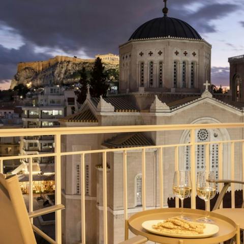 Admire the Acropolis vistas from the private balcony