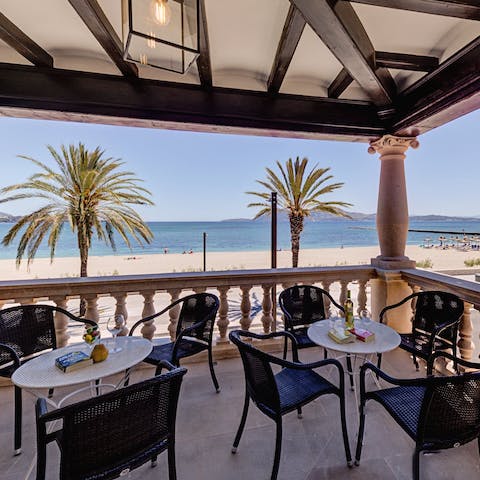 Enjoy a glass of afternoon sangria while looking out across the sea