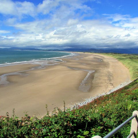 Sink your feet into the sand at nearby Harlech beach, 1.8km away