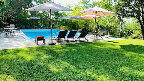 Pad along to the shared swimming pool and laze the day away