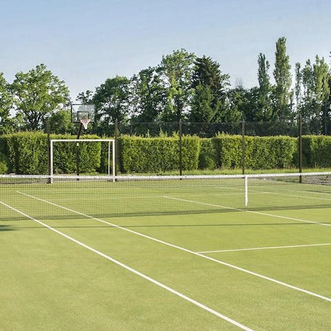 Play tennis or football by sunlight or the glow of the floodlights