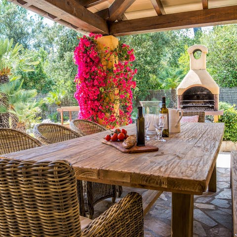 Light the barbecue and enjoy an alfresco meal on the covered terrace