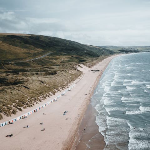 Pack up a picnic and head to Woolacombe Beach, just a twenty-eight minute drive