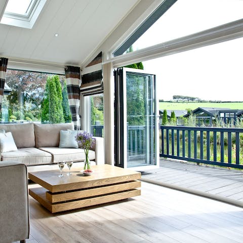 Slide open the bi-fold doors and let the outside in
