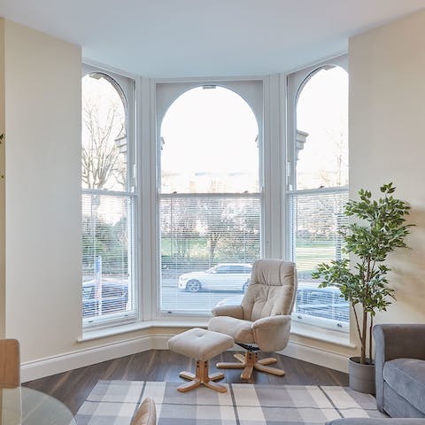 Kick back in the bay window armchair after a day at the beach