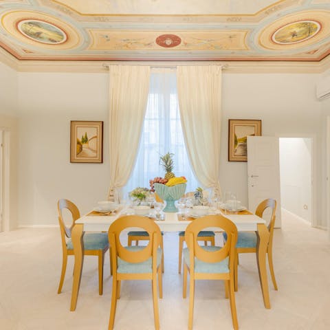 Sit down to an elegant Italian feast in the frescoed dining room