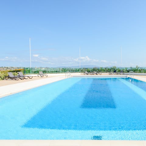 Cool off with a dip in the communal swimming pool after a day in the sunshine