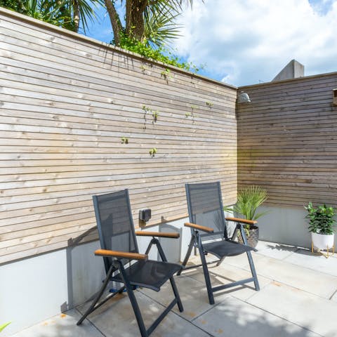 Take your morning coffee outside to start your day with bright sunlight and sea breeze hanging in the air