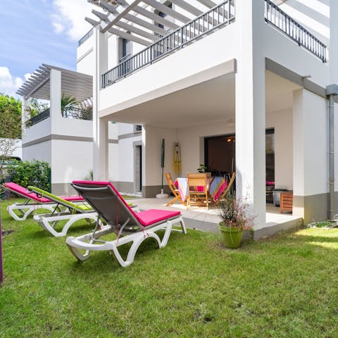 Catch some rays on the garden's sun loungers before enjoying a bite to eat alfresco