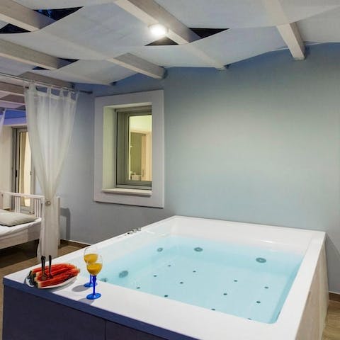 Spend your evenings bubbling away in the jacuzzi hot tub