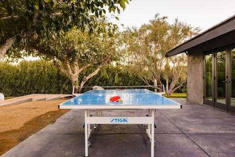 Organise a table tennis tournament in the sunshine