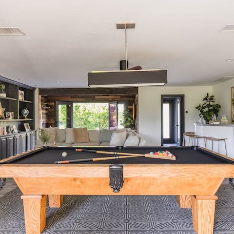 Get competitive and challenge your loved ones to a game of pool