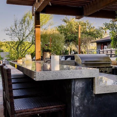 Mix your favourite cocktails at the outdoor bar