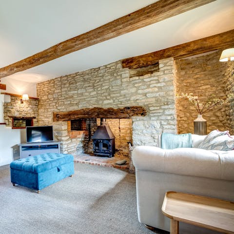 Cosy up with loved ones in front of the wood burner on cold winter nights