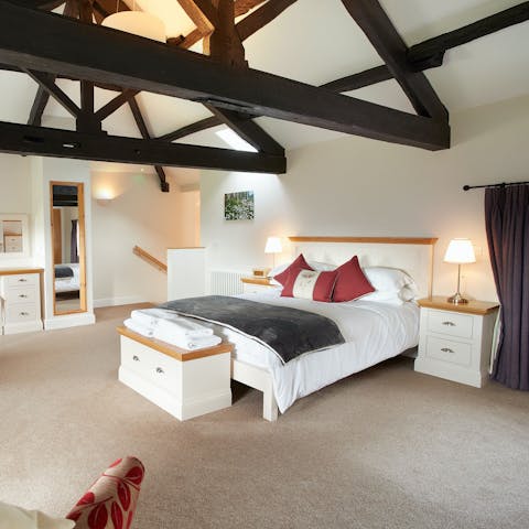 Fall asleep in the comfy king-size bed under the characterful beams