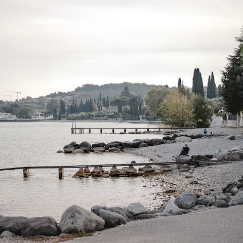 Drive seven minutes to Lake Garda's shores