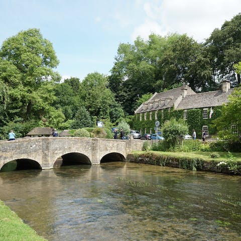 Stroll along River Coln in Bibury – a nineteen minute drive away