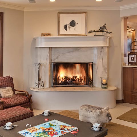 Play some card games, or board games, next to the wood-burning fireplace
