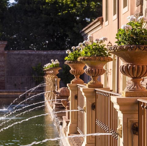 Dine by the peaceful trickle of a 17th-century fountain