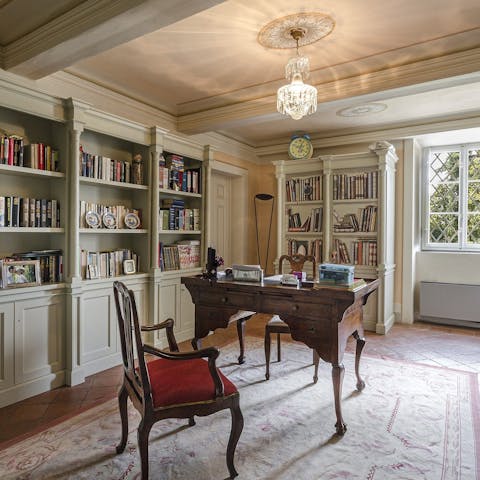Work remotely in style in the book-lined office