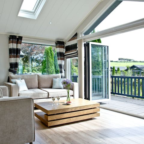 Sink into the sofas with the doors fully open to let a fresh breeze drift in