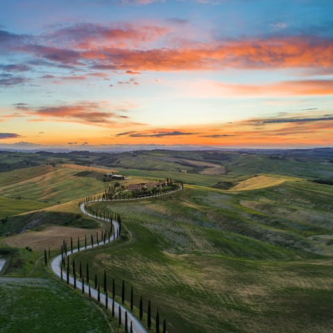 Discover the rugged landscapes and traditional architecture of Tuscany