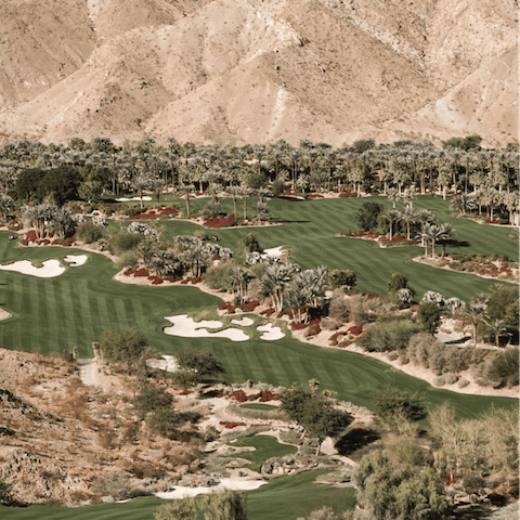 Drive ten minutes to Desert Dunes Golf Club for a round of golf