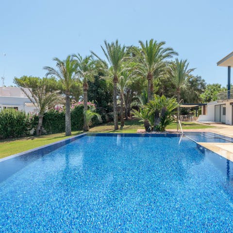 Soak up the sun as you swim in the private outdoor pool