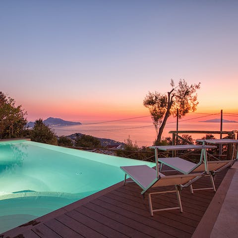 Take a sunset dip in the pool admiring the breathtaking views 