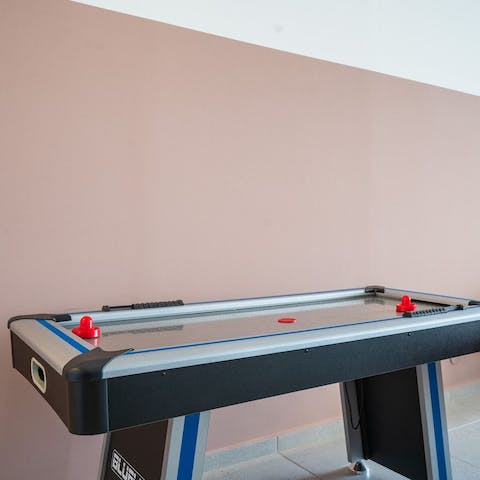 Challenge your family to an air hockey tournament without even leaving home