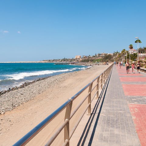 Feel the sand between your toes at Playa de San Agustín, a ten-minute walk away