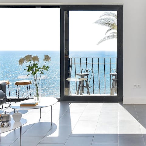 Admire the gorgeous ocean views from the small balcony – it's the perfect spot to watch the sunset