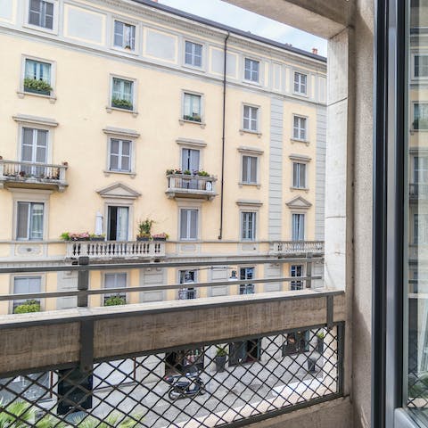 Peer out onto the bustle of Corso Como, it's right outside your door
