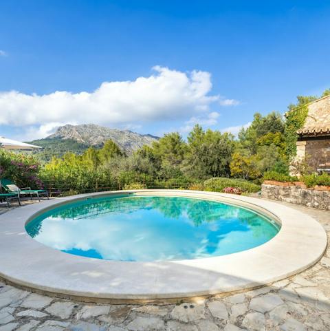 Splash about in the private pool after snoozing on a lounger