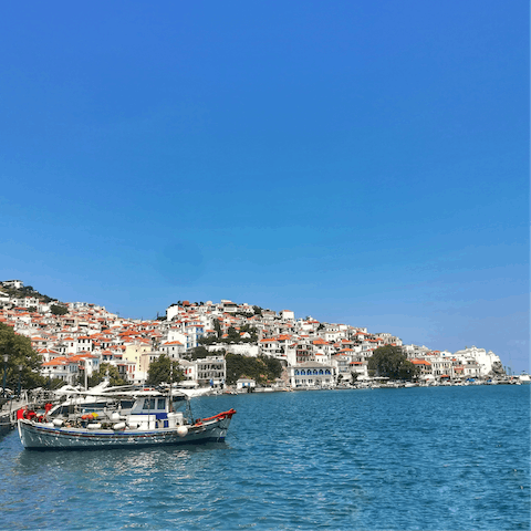 Arrange a boat tour of the coast from Skopelos port – it's thirteen minutes away