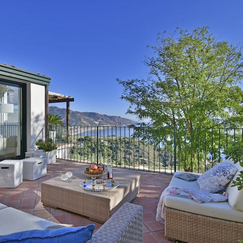 Enjoy an early-evening negroni on the sun-dappled terrace