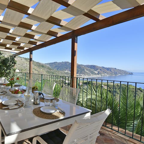 Gaze out to dramatic sea views from the alfresco dining area