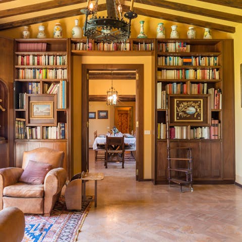 Choose your next read from the floor-to-ceiling bookshelves