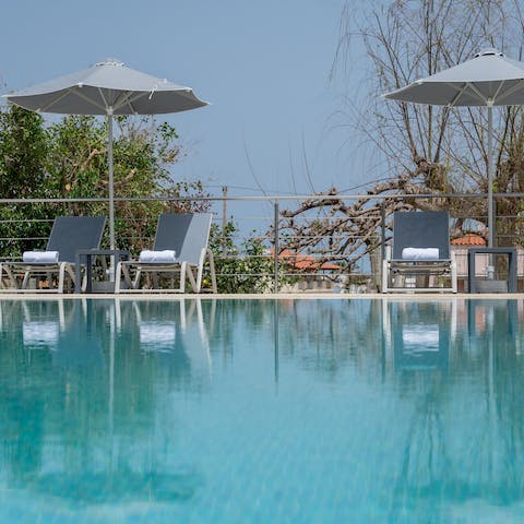 Alternate between the private pool and the sun loungers as you spend lazy days poolside