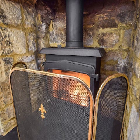 Get cosy in front of the wood-burning fire after a picturesque countryside walk