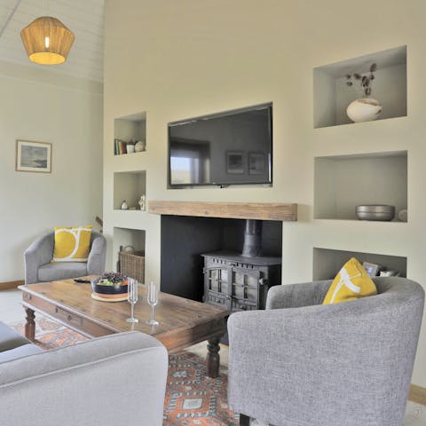 Snuggle up in front of one of two log burners