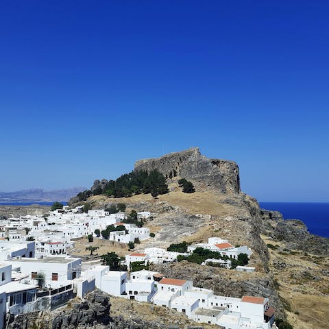 Explore the shops and cafes of pretty Lindos –  a 3.5km drive away