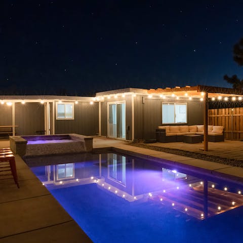 Switch on the fairy lights and stargaze from the hot tub