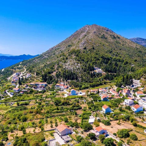 Stay in a quiet village between mountains and sea